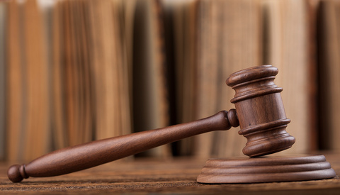 Photographer Removed From Courtroom and Charged With Contempt of Court